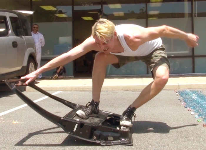 Scotch Wichmann performing a shamanic performance art piece called Crawling Through Glass for Chris Burden, Ventura, CA, 2015