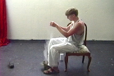 Scotch Wichmann performing a shamanic performance art piece called Sister's Teeth with Nate Dryden, Irvine, CA, 1993